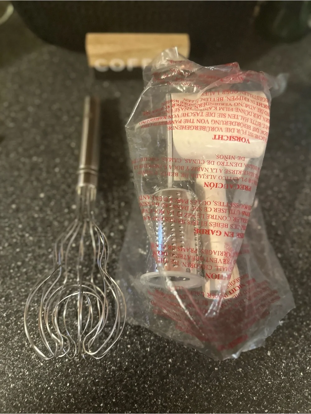 Pampered chef grater and wisk